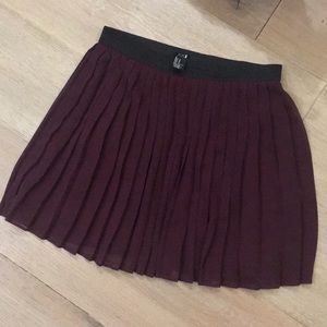 purple pleated skirt